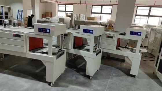 Machine à envelopper en rétrécissement par tunnel de type convoyeur pour le film automatique de bouteille d'eau à 220 V