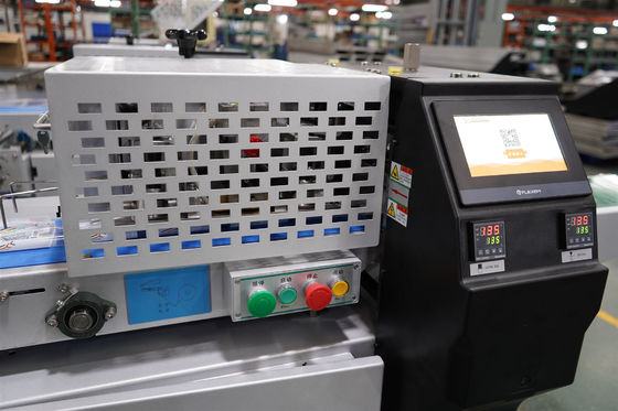 Machine d'emballage par écoulement de sacs à coussin horizontale à plusieurs fonctions