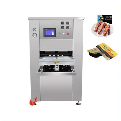 Machine d'emballage sous vide de matériaux d'emballage en plastique pour l'étanchéité des plateaux en atmosphère modifiée