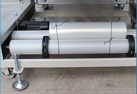Machine d'emballage en plastique PE à film à débit latéral à manche rétrécissante pour boîtes/bouteilles/boîtes