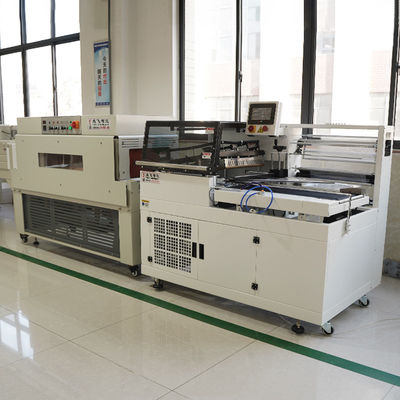 POF/PVC Film 450L 1350W L Bar Shrink Film Bag Wrapping Machine pour les solutions d'emballage