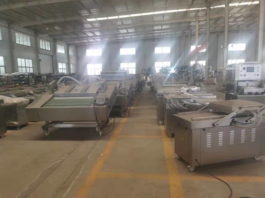 Machine d'emballage sous vide à rouleaux de type courroie continue pour crevettes séchées et saumon fumé