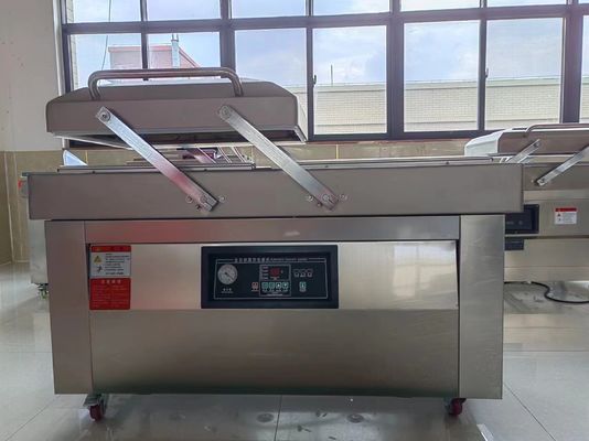 Machine de scellage à double chambre à vide pour emballage d'aliments à base de matériaux