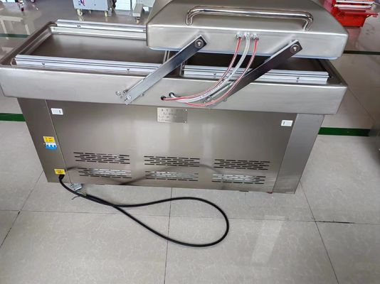 Machine de scellage à double chambre à vide pour emballage d'aliments à base de matériaux