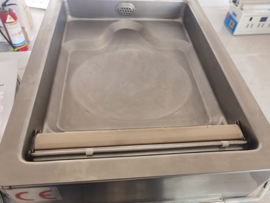 Appareil d'emballage sous vide à chambre unique pour les aliments dans les hôtels électrique